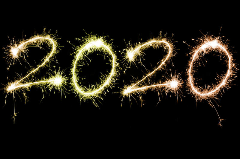 Blazing or sparkling bright 2020 new year celebration theme over black background
