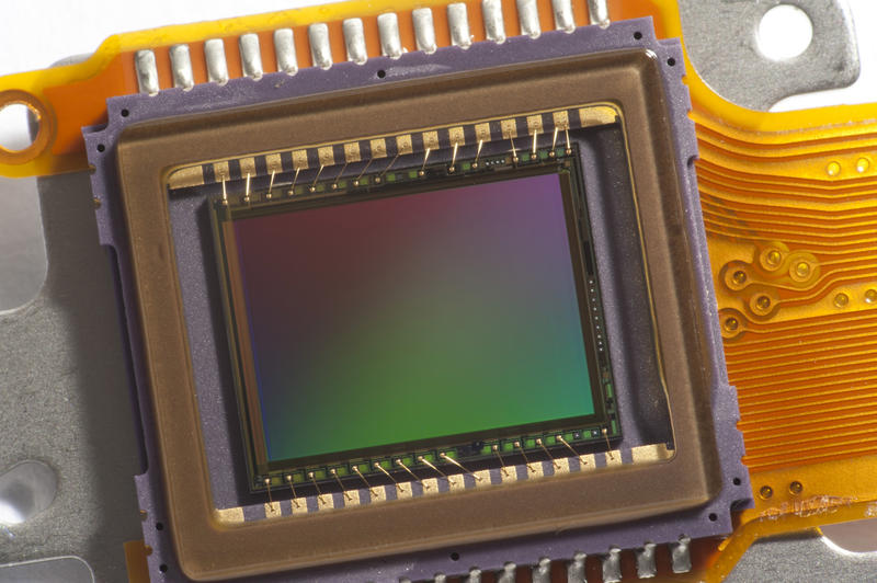 CCD chip sensor frame close-up macro image on white background
