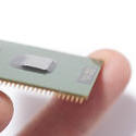 13787   Man holding CPU chip