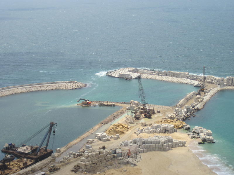 <p>building a sea wall</p>