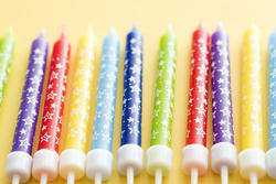 13087   Colorful row of birthday cake candles