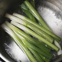 12990   Overhead view of a pot boiling with water