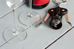 17141   Bottle opener with wineglasses and bottle of wine