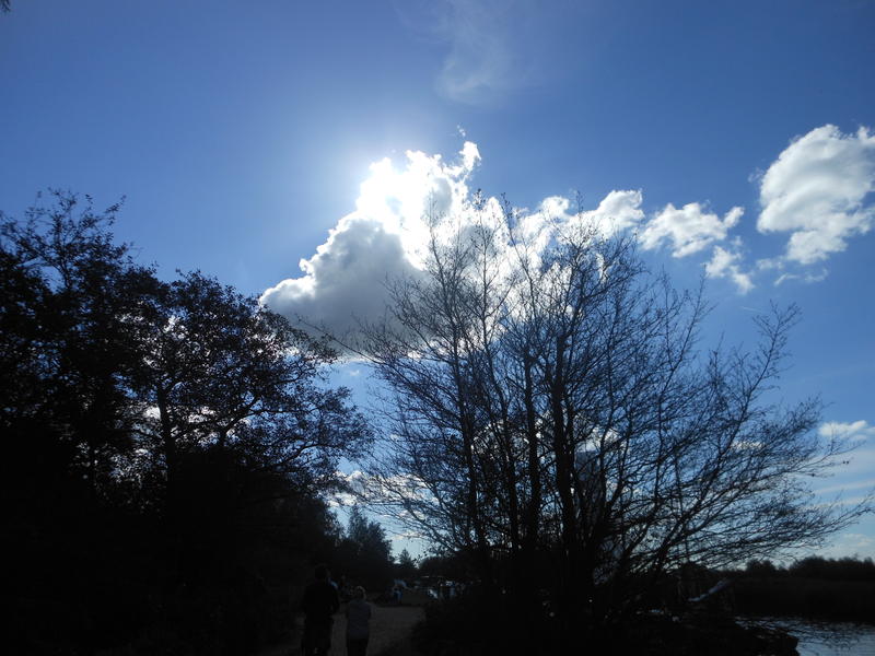 <p>bright backlit clouds sunny autumn day</p>
