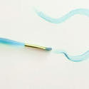 12147   Paintbrush with Blue Wavy Lines on White Paper