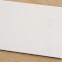 12728   Close up on half of white envelope