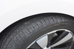 16349   Car tyre tread on a parked car