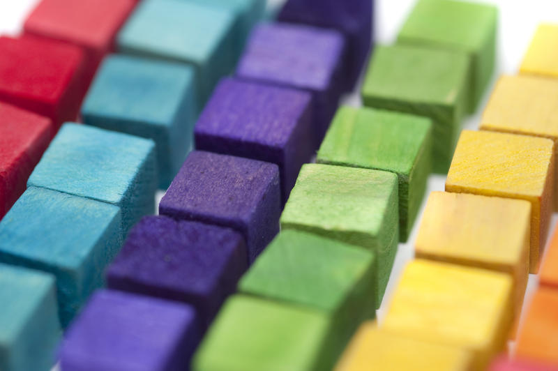 rows of colorful wooden toy blocks