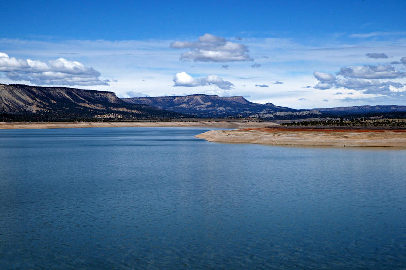 <p>New Mexico's El Vado Lake is very blue under blue skies. Scattered clouds can be seen in the distance. Chama and Heron Lake are nearby.</p>
<p><a href="http://pinterest.com/michaelkirsh/">http://pinterest.com/michaelkirsh/</a></p>