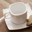 17152   Clean white coffee cup and saucer