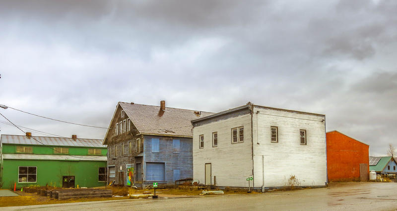 <p>The old farmers market Rutland Vermont with different color buildings.</p>