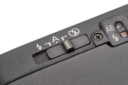 12170   Close up on flash mode switch on camera
