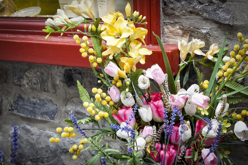 <p>A floral display outside a country cottage.</p>
