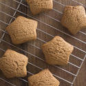 17169   Freshly baked gingerbread star cookies on a rack