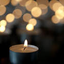stock image 13458   Tealight candle with bokeh background