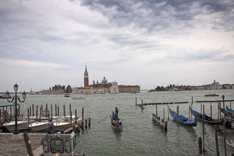 <p>Passengers on a gondola trip in Venice, Italy</p>
