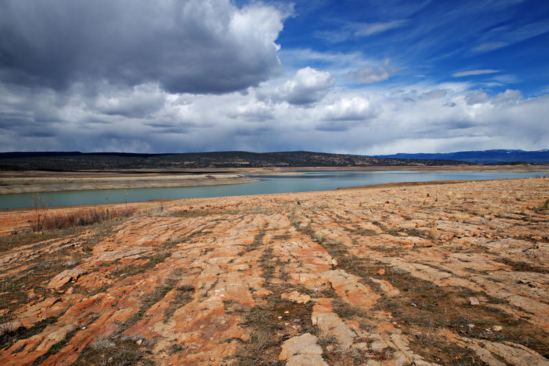 <p>Storm clouds gather over New Mexico's Heron Lake. Chama and El Vado Lake are nearby.</p>