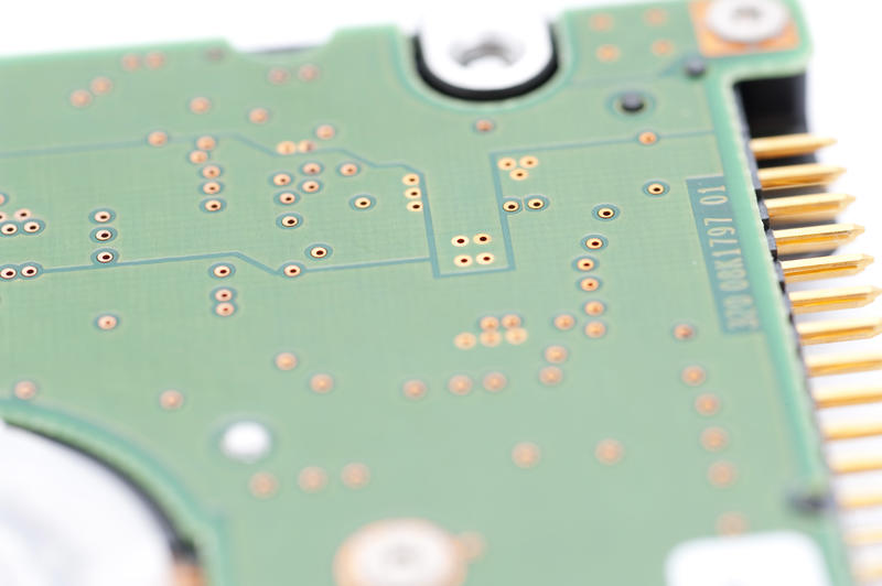 Hard disk drive close-up with IDE connector pins in focus