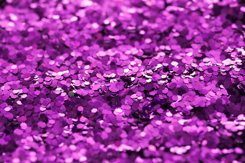 background of shimmering purple glitter sparkles