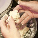 13015   shaping course dough into dumplings