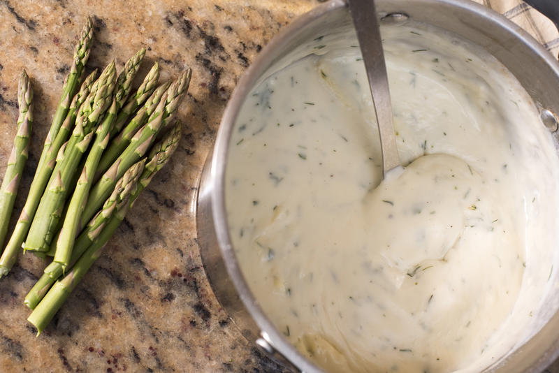 Making a roux sauce with equal quantities of flour and fat as a base for savory sauces