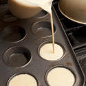 13018   pouring fresh batter into a baking tray