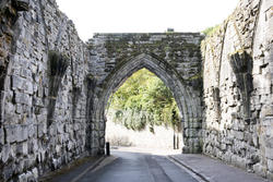 12790   Old archway over narrow street in St Andrews