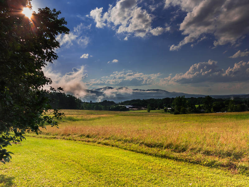 <p>Meadows, clouds and sky in rural Vermont.</p>