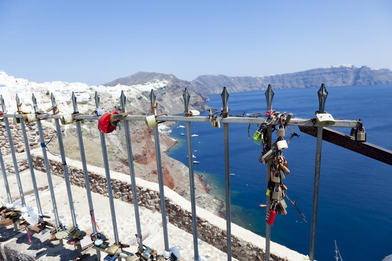 <p>Locked padlocks in Oia in Santorini have been left by couples as a symbol of love. Santorini is often known as the &#39;honeymoon island&#39; due to its popularity as a wedding and honeymoon venue.</p>
