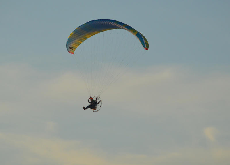 <p>Paragliding over the beach on a sunny evening. Photographed by the sea in Cleveleys near to Blackpool in the UK.</p>

<p>More photos like this on my website at -&nbsp;https://www.dreamstime.com/dawnyh_info</p>
Paragliding over the beach on a sunny evening