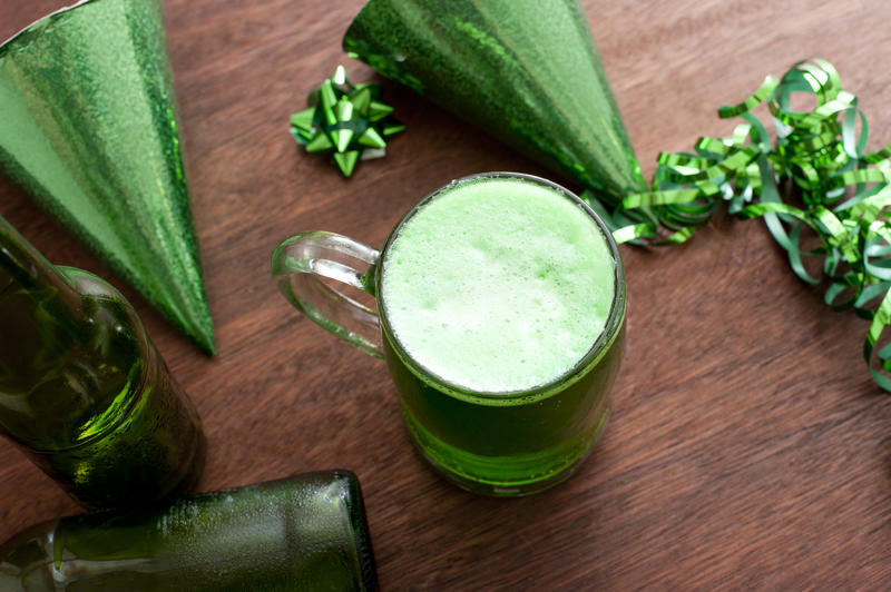 background image representing a st patricks day party with green coloured beer tankard