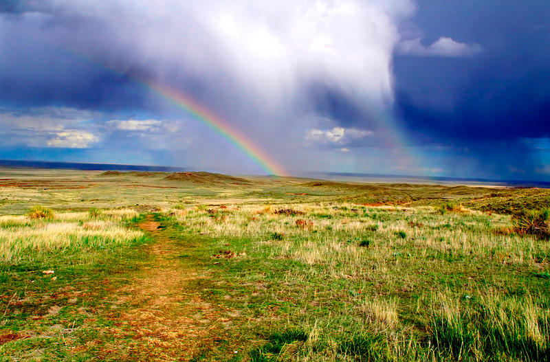 <p>At the Pawnee Buttes National Grasslands a rainbow appears amidst evening storms.</p>
