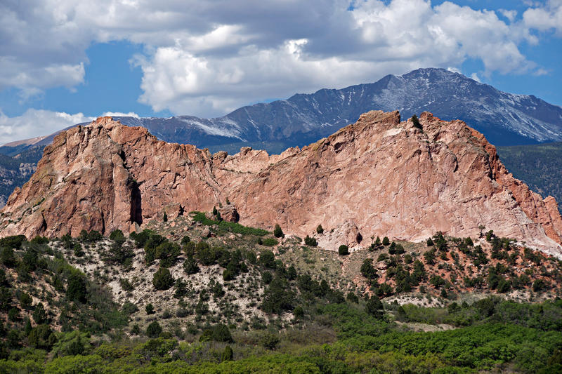 <p>Pikes Peak and storm clouds can be seen behind Kindergarten Rock at the Garden of the Gods in Colorado Springs.</p>

<p><br />
<a href="http://pinterest.com/michaelkirsh/">http://pinterest.com/michaelkirsh/</a></p>
