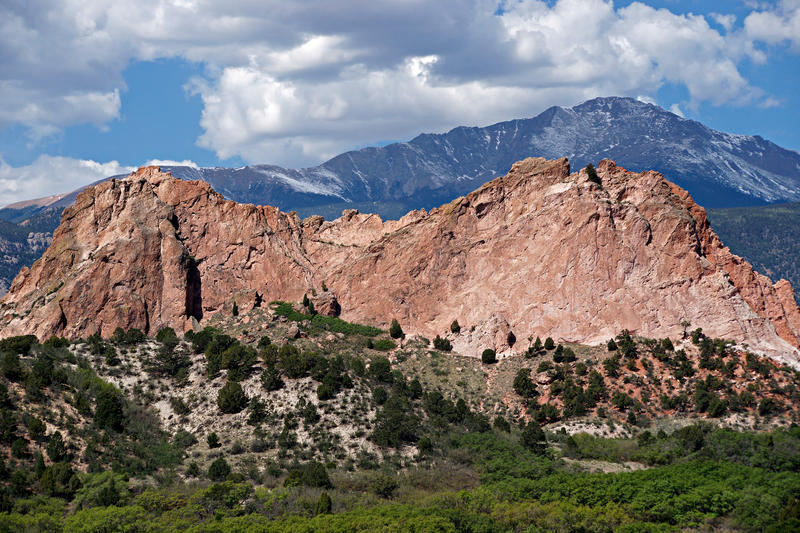 <p>Pikes Peak and storm clouds can be seen behind Kindergarten Rock at the Garden of the Gods in Colorado Springs.</p>
<p><br />
<a href="http://pinterest.com/michaelkirsh/">http://pinterest.com/michaelkirsh/</a></p>
