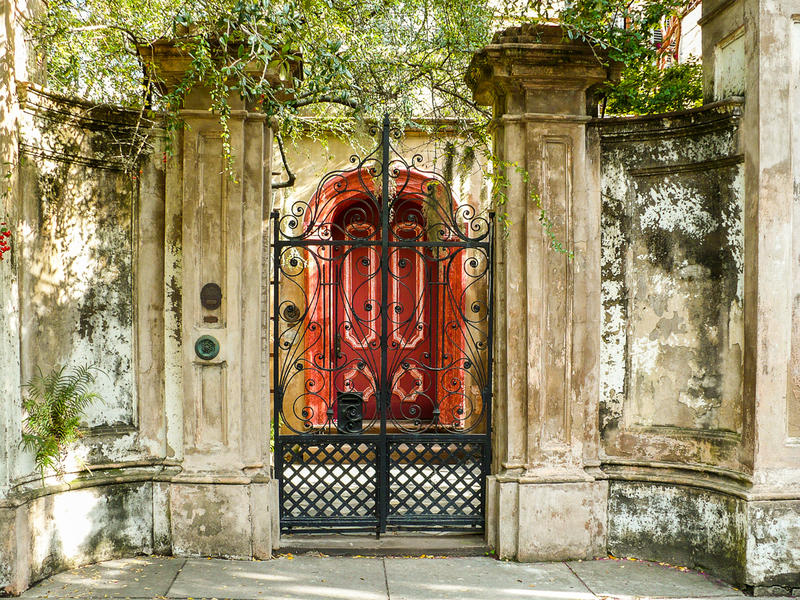 <p>Rasberry red entrance doors.</p>