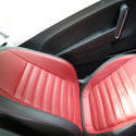 16359   Red leather seat in a modern car