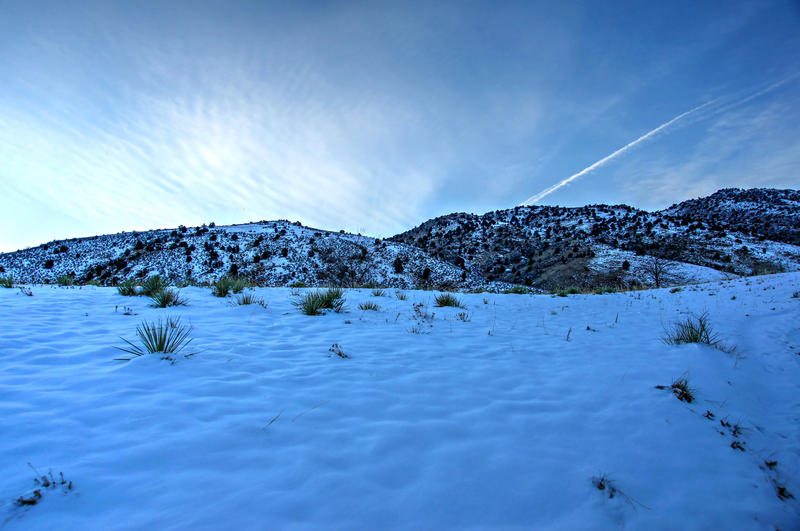<p>This is Denver's Red Rocks Park at winter twilight. The sun had just set leaving a deep blue sky and interesting clouds.</p>
