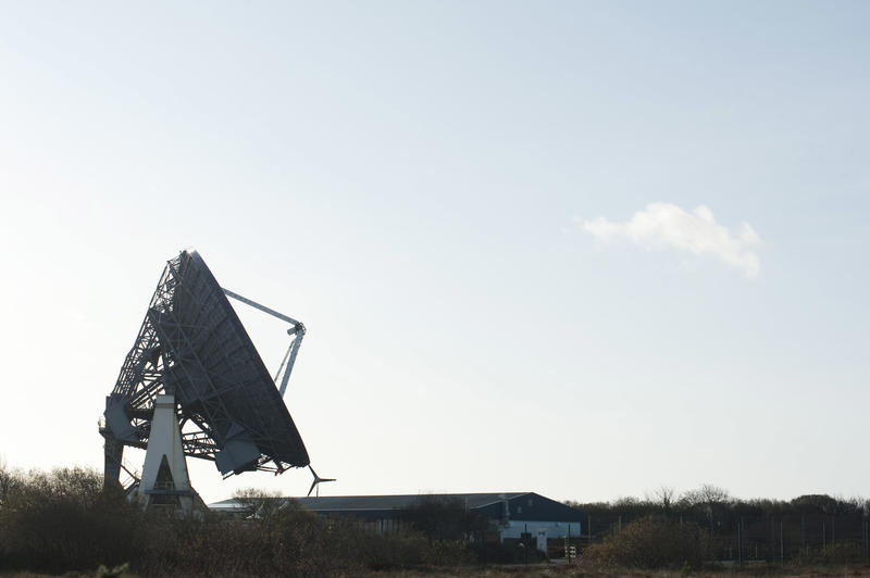 Satellite phone system ground station side view against clear sky