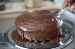 12343   Knife cutting into chocolate cake