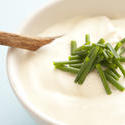 13033   Small bowl of thick and creamy soup with spoon