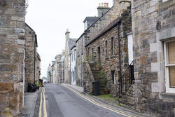 12866   Empty narrow street with old stone houses