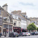 12868   Parked cars and tourists in Saint Andrews Scotland