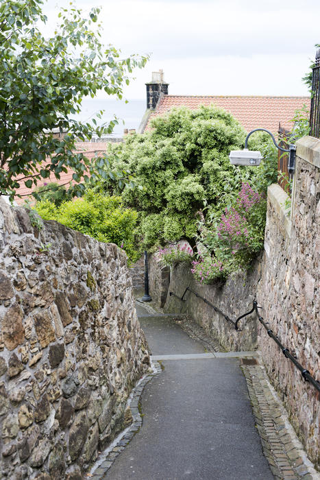 Narrow stone passage between houses, Pittenweem, Scotland a fishing village on the Fife coast