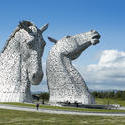 12874   People walking past the Kelpies statues