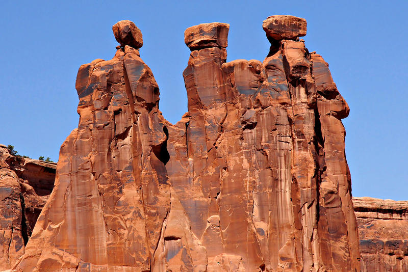<p>This is the Three Gossips at Arches National Park near Moab Utah.</p>
<p><a href="http://pinterest.com/michaelkirsh/">http://pinterest.com/michaelkirsh/</a></p>
