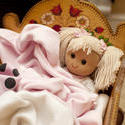 11955   Blond doll in a crib