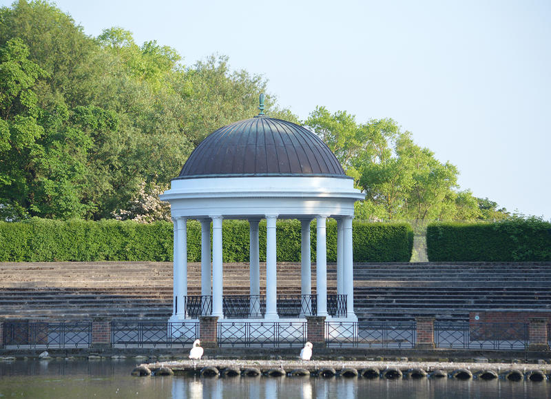 <p>Victorian bandstand by a lake</p>
Victorian bandstand by a lake