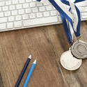 11909   Silver Medals on Rustic Wood Computer Desk
