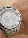 11904   Silver electronic watch on the wrist of a man