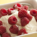 13039   Plain creamy yogurt topped with fresh raspberries
